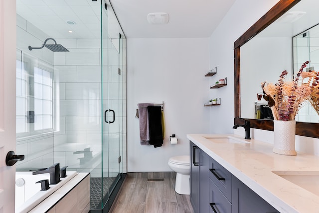 example of contrasting colors in a bathroom with white walls, light countertops, dark cabinets and  dark hardware