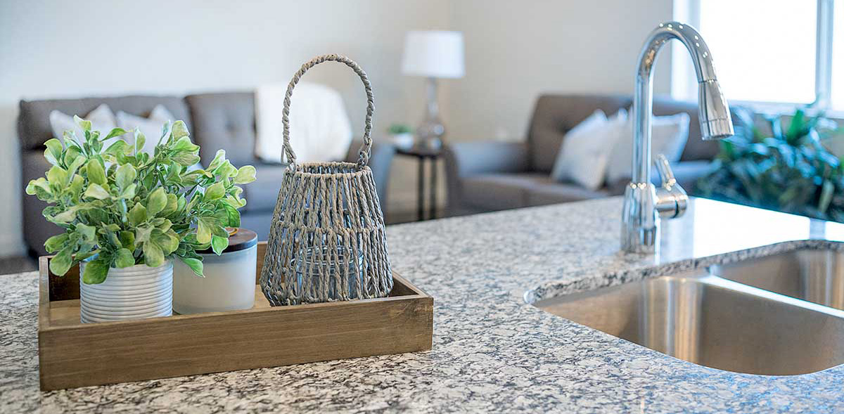 Details make the difference in this photo of a countertop overlooking the living room 